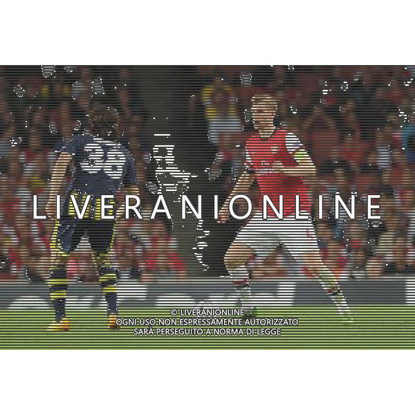  Per Mertesacker playing in the Champions League qualifier second leg, between Arsenal and Fenerbahce at The Emirates Stadium, London, on Tuesday August 27, 2013. ©photoshot/AGENZIA ALDO LIVERANI SAS - ITALY ONLY - EDITORIAL USE ONLY