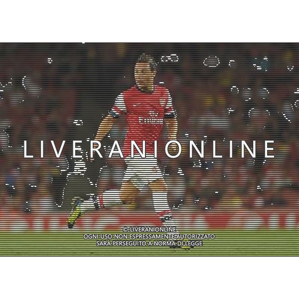  Santi Cazorla playing in the Champions League qualifier second leg, between Arsenal and Fenerbahce at The Emirates Stadium, London, on Tuesday August 27, 2013. ©photoshot/AGENZIA ALDO LIVERANI SAS - ITALY ONLY - EDITORIAL USE ONLY