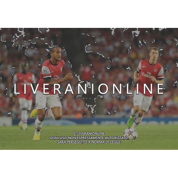  Theo Walcott playing in the Champions League qualifier second leg, between Arsenal and Fenerbahce at The Emirates Stadium, London, on Tuesday August 27, 2013. ©photoshot/AGENZIA ALDO LIVERANI SAS - ITALY ONLY - EDITORIAL USE ONLY