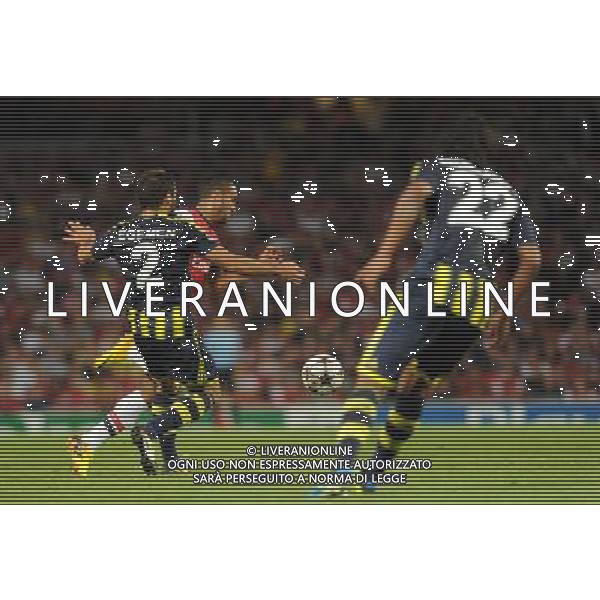  Theo Walcott playing in the Champions League qualifier second leg, between Arsenal and Fenerbahce at The Emirates Stadium, London, on Tuesday August 27, 2013. ©photoshot/AGENZIA ALDO LIVERANI SAS - ITALY ONLY - EDITORIAL USE ONLY