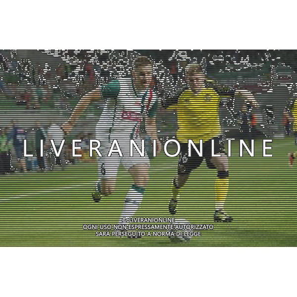 WROCLAW POLSKA 29-08-2013 SEZON 2013/2014 4 RUNDA ELIMINACYJNA LIGA EUROPY WKS SLASK WROCLAW POLSKA vs SEVILLA FC HISZPANIA NZ TOMASZ HOLOTA - ALBERTO MORENO FOT KRYSTYNA PACZKOWSKA/PRZEGLAD SPORTOWY/NEWSPIX.PL SEASON 2013 2014 FOURTH QUALIFYING ROUND LEAGUE EUROPE MATCH WKS SLASK WROCLAW vs SEVILLA FC --- Newspix.pl AG ALDO LIVERANI SAS ONLY ITALY *** Local Caption *** www.newspix.pl mail us: info@newspix.pl call us: 0048 022 23 22 222 --- Polish Picture Agency by Ringier Axel Springer Poland