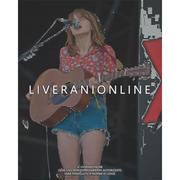  Trinity Jersey CI : Gabrielle Aplin performing on the main stage at 2013 Jersey Live Festival.Jersey Live is celebrating its 10th anniversary. Date 01/09/2013 ©PHOTOSHOT/AGENZIA ALDO LIVERANI SAS - ITALY ONLY - EDITORIAL USE ONLY