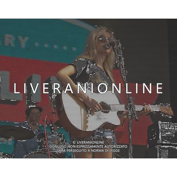  Trinity Jersey CI : Nina Nesbitt performing on the main stage at 2013 JerseyLive Festival.JerseyLive is celebrating its tenth year. Date 31/08/2013 ©PHOTOSHOT/AGENZIA ALDO LIVERANI SAS - ITALY ONLY - EDITORIAL USE ONLY