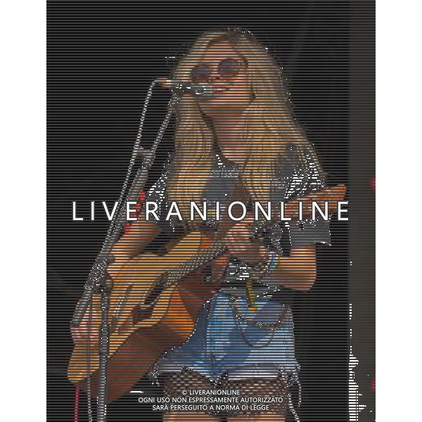  Trinity Jersey CI : Nina Nesbitt performing on the main stage at 2013 JerseyLive Festival.JerseyLive is celebrating its tenth year. Date 31/08/2013 ©PHOTOSHOT/AGENZIA ALDO LIVERANI SAS - ITALY ONLY - EDITORIAL USE ONLY