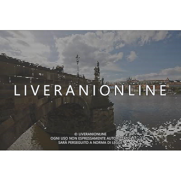 (130912) -- BRUSSELS, Sept. 12, 2013 () -- The photo taken on Sept. 1, 2013 shows the Vltava River and the Charles Bridge in Prague, capital of Czech Republic, As home to a number of famous cultural attractions, the extensive historic centre of Prague has been included in the UNESCO World Heritage List since 1992. In the course of the 1100 years of its existence, Prague¡¯s development can be documented in the architectural expression of many historical periods and their styles. (/Zhou Lei) ©PHOTOSHOT/AGENZIA ALDO LIVERANI SAS - ITALY ONLY - EDITORIAL USE ONLY - Vedute dei monumenti della citta di Praga, capitale della Repubblica Ceca, inserita nella lista del patrimonio mondiale dell\'UNESCO dal 1992.