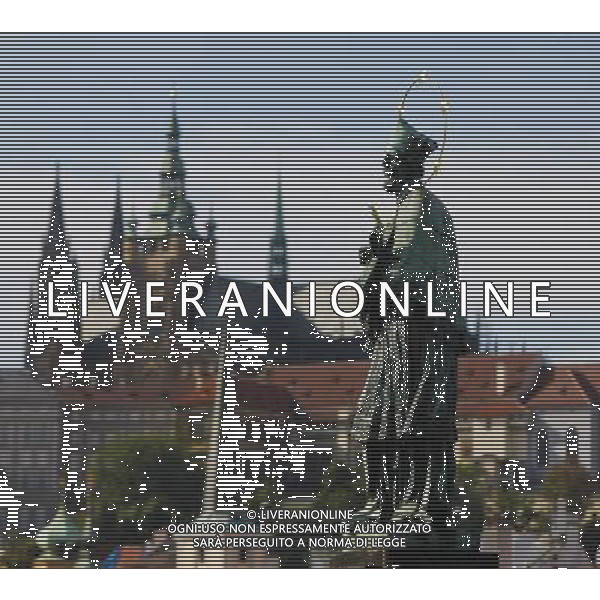 (130912) -- BRUSSELS, Sept. 12, 2013 () -- The photo taken on Sept. 1, 2013 shows the statue on the Charles Bridge and St. Vitus Cathedral of Prague, capital of Czech Republic, As home to a number of famous cultural attractions, the extensive historic centre of Prague has been included in the UNESCO World Heritage List since 1992. In the course of the 1100 years of its existence, Prague¡¯s development can be documented in the architectural expression of many historical periods and their styles. (/Zhou Lei) ©PHOTOSHOT/AGENZIA ALDO LIVERANI SAS - ITALY ONLY - EDITORIAL USE ONLY - Vedute dei monumenti della citta di Praga, capitale della Repubblica Ceca, inserita nella lista del patrimonio mondiale dell\'UNESCO dal 1992.