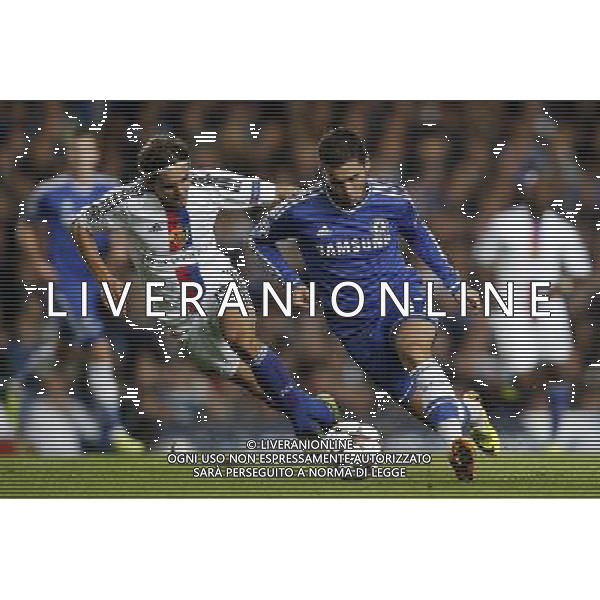 (130919) -- LONDON, Sept. 19, 2013 () -- Eden Hazard (R) of Chelsea FC vies with Kay Voser of FC Basel 1893 during the UEFA Champions League Group E match between Chelsea FC and FC Basel 1893 at Stamford Bridge Stadium in London, Britain, on Sept. 18, 2013. Chelsea lost 1-2. (/Wang Lili) ©PHOTOSHOT/AGENZIA ALDO LIVERANI SAS - ITALY ONLY - CHELSEA - BASILEA