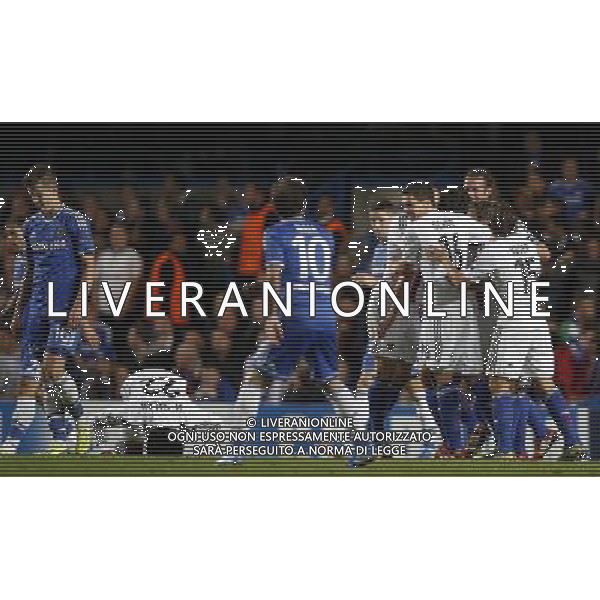 (130919) -- LONDON, Sept. 19, 2013 () -- Mohamed Salah(2nd, L) of FC Basel 1893 kisses the field to celebrate scoring during the UEFA Champions League Group E match between Chelsea FC and FC Basel 1893 at Stamford Bridge Stadium in London, Britain, on Sept. 18, 2013. Chelsea lost 1-2. (/Wang Lili) ©PHOTOSHOT/AGENZIA ALDO LIVERANI SAS - ITALY ONLY - CHELSEA - BASILEA