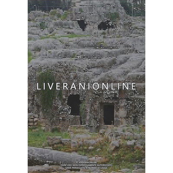 (130920) -- SYRACUSE, Sept. 20, 2013 () -- The photo taken on Sept. 5, 2013 shows the tomb of the preeminent mathematician and engineer Archimedes in Syracuse in Sicily, Italy, . Located in the southeast corner of the island of Sicily, Syracuse is a historic city in Italy. The 2,700-year-old city founded in 734 or 733 BC by Greek settlers from Corinth and Tenea played a key role in ancient times when it was one of the major powers of the Mediterranean world. Once described by Cicero, renowned Roman philosopher and orator, as \'the greatest Greek city and the most beautiful of them all\', the city was listed by UNESCO as a World Heritage Site along with the Necropolis of Pantalica in 2005. (/Zhou Lei) ©PHOTOSHOT/AGENZIA ALDO LIVERANI SAS - ITALY ONLY - EDITORIAL USE ONLY