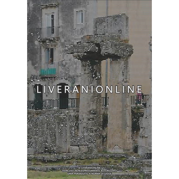 (130920) -- SYRACUSE, Sept. 20, 2013 () -- A man walks past the ruins of the Temple of Apollo in Ortigia, the old town of Syracuse in Sicily, Italy, Sept. 5, 2013. Located in the southeast corner of the island of Sicily, Syracuse is a historic city in Italy. The 2,700-year-old city founded in 734 or 733 BC by Greek settlers from Corinth and Tenea played a key role in ancient times when it was one of the major powers of the Mediterranean world. Once described by Cicero, renowned Roman philosopher and orator, as \'the greatest Greek city and the most beautiful of them all\', the city was listed by UNESCO as a World Heritage Site along with the Necropolis of Pantalica in 2005. (/Zhou Lei) ©PHOTOSHOT/AGENZIA ALDO LIVERANI SAS - ITALY ONLY - EDITORIAL USE ONLY