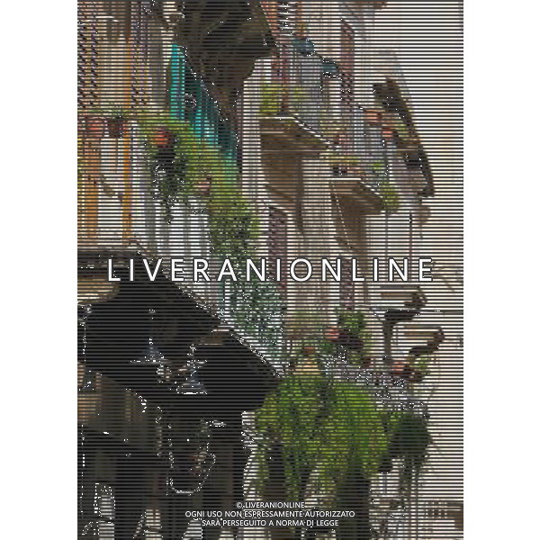 (130920) -- SYRACUSE, Sept. 20, 2013 () -- The photo taken on Sept. 5, 2013 shows the balconies in Ortigia, the old town of Syracuse in Sicily, Italy. Located in the southeast corner of the island of Sicily, Syracuse is a historic city in Italy. The 2,700-year-old city founded in 734 or 733 BC by Greek settlers from Corinth and Tenea played a key role in ancient times when it was one of the major powers of the Mediterranean world. Once described by Cicero, renowned Roman philosopher and orator, as \'the greatest Greek city and the most beautiful of them all\', the city was listed by UNESCO as a World Heritage Site along with the Necropolis of Pantalica in 2005. (/Zhou Lei) ©PHOTOSHOT/AGENZIA ALDO LIVERANI SAS - ITALY ONLY - EDITORIAL USE ONLY