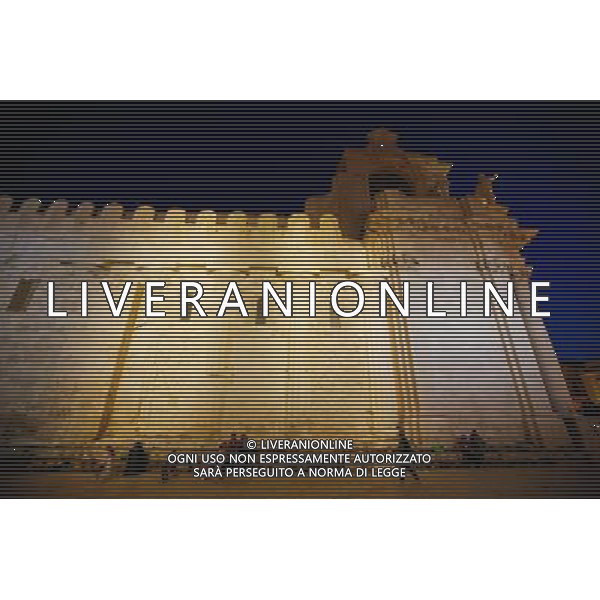 (130920) -- SYRACUSE, Sept. 20, 2013 () -- Local residents rest before the Cathedral, formerly the great Temple of Athena (5th century BC), in Ortigia, the old town of Syracuse in Sicily, Italy, Sept. 4, 2013. Located in the southeast corner of the island of Sicily, Syracuse is a historic city in Italy. The 2,700-year-old city founded in 734 or 733 BC by Greek settlers from Corinth and Tenea played a key role in ancient times when it was one of the major powers of the Mediterranean world. Once described by Cicero, renowned Roman philosopher and orator, as \'the greatest Greek city and the most beautiful of them all\', the city was listed by UNESCO as a World Heritage Site along with the Necropolis of Pantalica in 2005. (/Zhou Lei) ©PHOTOSHOT/AGENZIA ALDO LIVERANI SAS - ITALY ONLY - EDITORIAL USE ONLY
