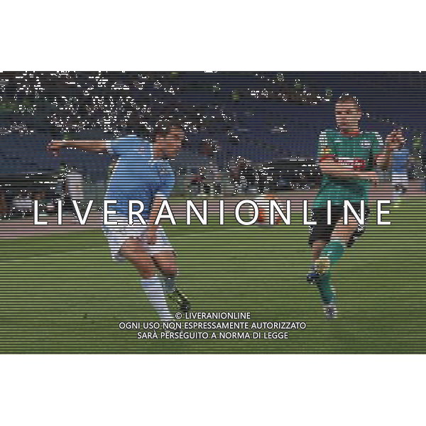 RZYM 19.09.2013 MECZ 1. KOLEJKA LIGA EUROPY GRUPA J SEZON 2013/14: SS LAZIO RZYM - LEGIA WARSZAWA --- UEFA EUROPA LEAGUE GROUP J MATCH: LAZIO ROME - LEGIA WARSAW ALVARO GONZALEZ TOMASZ BRZYSKI FOT. PIOTR KUCZA/NEWSPIX.PL --- Newspix.pl AG ALDO LIVERANI SAS ONLY ITALY *** Local Caption *** www.newspix.pl mail us: info@newspix.pl call us: 0048 022 23 22 222 --- Polish Picture Agency by Ringier Axel Springer Poland