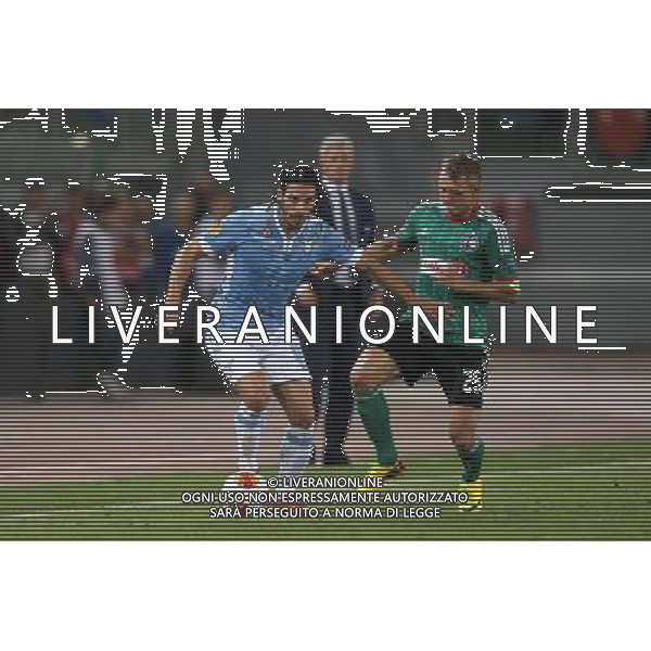 RZYM 19.09.2013 MECZ 1. KOLEJKA LIGA EUROPY GRUPA J SEZON 2013/14: SS LAZIO RZYM - LEGIA WARSZAWA 1:0 --- UEFA EUROPA LEAGUE GROUP J MATCH: LAZIO ROME - LEGIA WARSAW 1:0 SERGIO FLOCCARI JAKUB RZEZNICZAK FOT. PIOTR KUCZA/NEWSPIX.PL --- Newspix.pl *** Local Caption *** www.newspix.pl mail us: info@newspix.pl call us: 0048 022 23 22 222 --- Polish Picture Agency by Ringier Axel Springer Poland