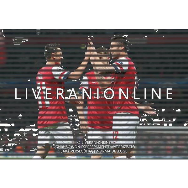 Arsenal\'s Olivier Giroud celebrates scoring his sides second goal with Arsenal\'s Mesut Ozil Photo by Kieran Galvin/CameraSport Football - UEFA Champions League Group F - Arsenal v Napoli - Tuesday 1st October 2013 - The Emirates Stadium - London Œ© CameraSport - 43 Linden Ave. Countesthorpe. Leicester. England. LE8 5PG - Tel: +44 (0) 116 277 4147 - admin@camerasport.com - www.camerasport.com AG ALDO LIVERANI SAS ONLY ITALY