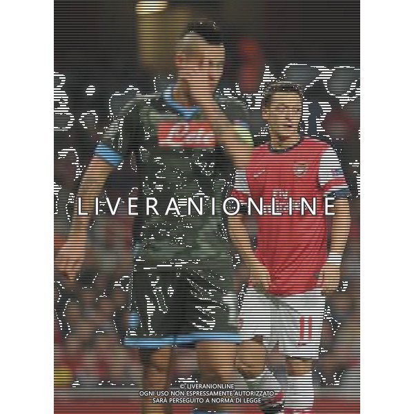  Mesut Ozil playing in the Champions League match between Arsenal and Napoli. Held at the Emirates Stadium, London, on Tuesday October 01, 2013. ©photoshot/AGENZIA ALDO LIVERANI SAS - ITALY ONLY - EDITORIAL USE ONLY