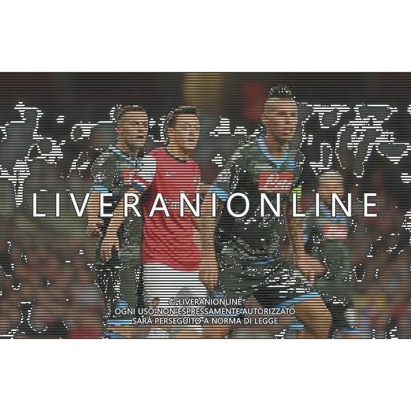 Mesut Ozil playing in the Champions League match between Arsenal and Napoli. Held at the Emirates Stadium, London, on Tuesday October 01, 2013. ©photoshot/AGENZIA ALDO LIVERANI SAS - ITALY ONLY - EDITORIAL USE ONLY