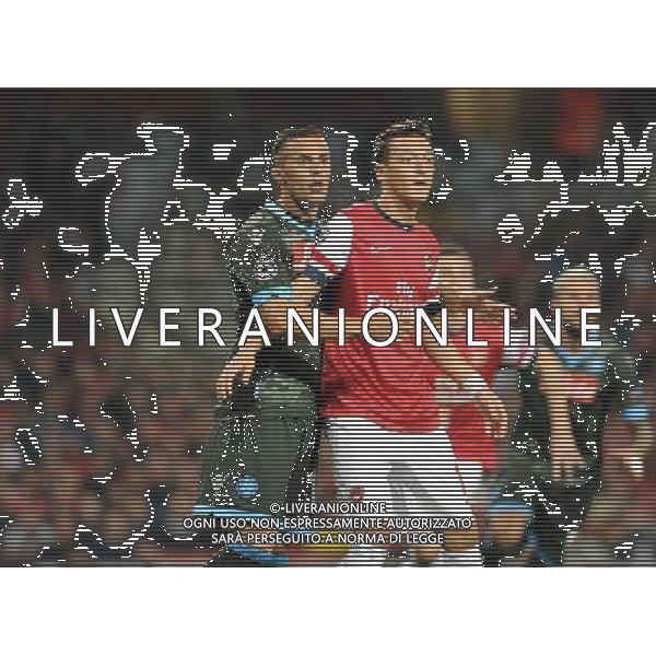  Mesut Ozil playing in the Champions League match between Arsenal and Napoli. Held at the Emirates Stadium, London, on Tuesday October 01, 2013. ©photoshot/AGENZIA ALDO LIVERANI SAS - ITALY ONLY - EDITORIAL USE ONLY