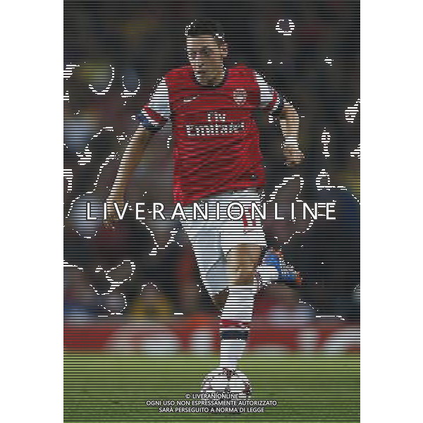 (131002) -- LONDON, Oct. 2, 2013 () -- Mesut Ozil of Arsenal runs with the ball during the UEFA Champions League Group F match between Arsenal and Napoli at Emirates Stadium in London, Britain, on Oct. 1, 2013. Arsenal won 2-0. (/Wang Lili) ©photoshot/AGENZIA ALDO LIVERANI SAS - ITALY ONLY - EDITORIAL USE ONLY