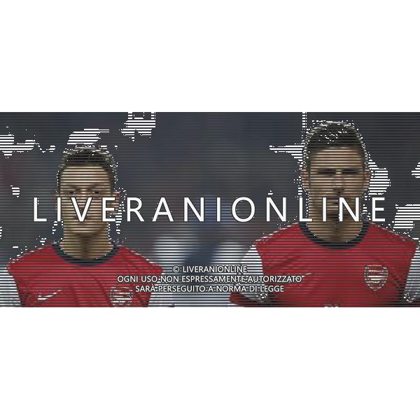 (131002) -- LONDON, Oct. 2, 2013 () -- Mesut Ozil(L) and Olivier Giroud of Arsenal line up ahead of the UEFA Champions League Group F match between Arsenal and Napoli at Emirates Stadium in London, Britain, on Oct. 1, 2013. Arsenal won 2-0. (/Wang Lili) ©photoshot/AGENZIA ALDO LIVERANI SAS - ITALY ONLY - EDITORIAL USE ONLY