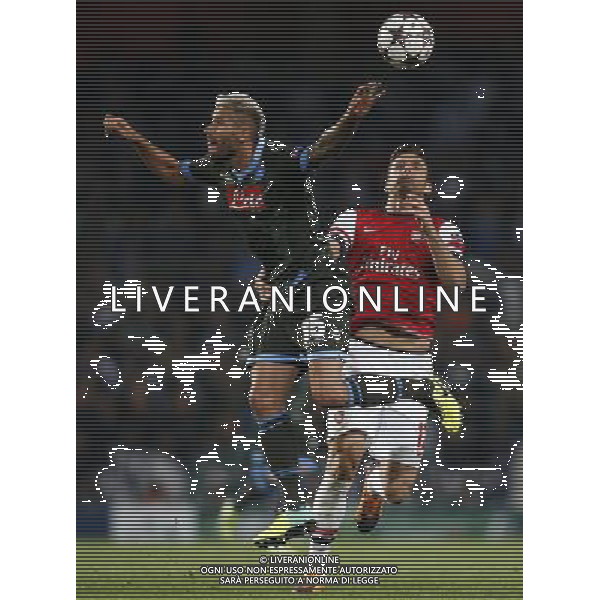 (131002) -- LONDON, Oct. 2, 2013 () -- Olivier Giroud(R) of Arsenal vies with Valon Behrami of Napoli during the UEFA Champions League Group F match between Arsenal and Napoli at Emirates Stadium in London, Britain, on Oct. 1, 2013. Arsenal won 2-0. (/Wang Lili) ©photoshot/AGENZIA ALDO LIVERANI SAS - ITALY ONLY - EDITORIAL USE ONLY