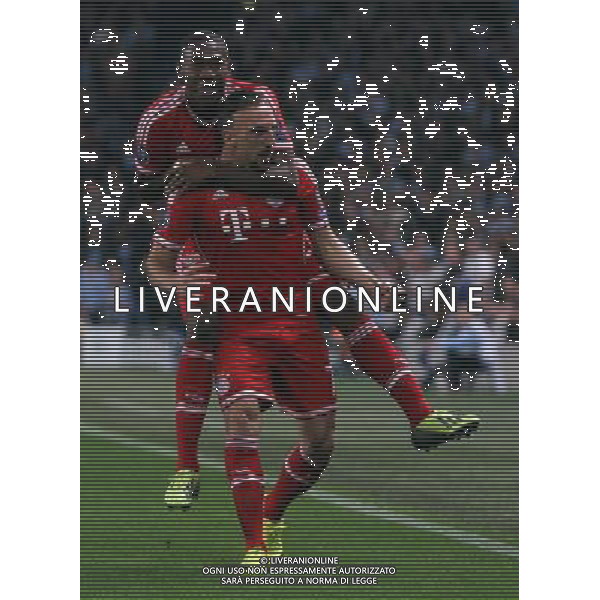 Bayern Munich\'s Franck Ribery (right) celebrates scoring the opening goal with teammate David Alaba Photo by Rich Linley/CameraSport Football - UEFA Champions League Group D - Manchester City v Bayern Munich - Wednesday 2nd October 2013 - Etihad Stadium - Manchester © CameraSport - 43 Linden Ave. Countesthorpe. Leicester. England. LE8 5PG - Tel: +44 (0) 116 277 4147 - admin@camerasport.com - www.camerasport.com AG ALDO LIVERANI SAS ONLY ITALY
