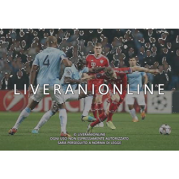 Bayern Munich\'s Bastian Schweinsteiger is fouled by Manchester City\'s Micah Richards Photo by Rich Linley/CameraSport Football - UEFA Champions League Group D - Manchester City v Bayern Munich - Wednesday 2nd October 2013 - Etihad Stadium - Manchester © CameraSport - 43 Linden Ave. Countesthorpe. Leicester. England. LE8 5PG - Tel: +44 (0) 116 277 4147 - admin@camerasport.com - www.camerasport.com AG ALDO LIVERANI SAS ONLY ITALY