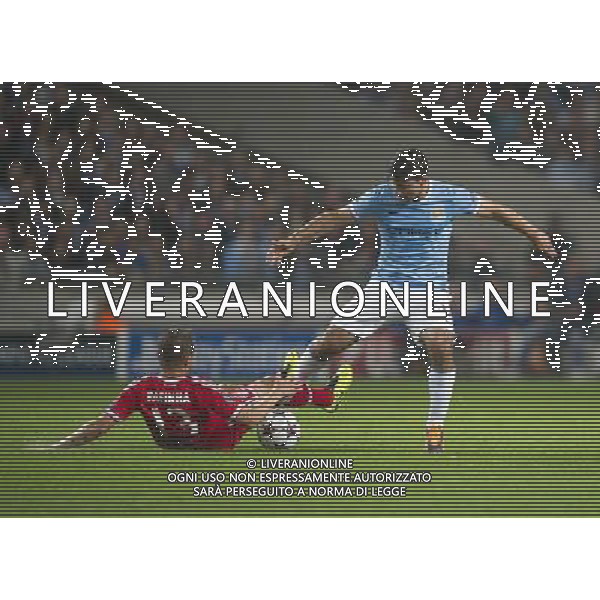 Manchester City\'s Sergio Aguero and Bayern Munich\'s Rafinha Photo by Stephen White/CameraSport Football - UEFA Champions League Group D - Manchester City v Bayern Munich - Wednesday 2nd October 2013 - Etihad Stadium - Manchester å© CameraSport - 43 Linden Ave. Countesthorpe. Leicester. England. LE8 5PG - Tel: +44 (0) 116 277 4147 - admin@camerasport.com - www.camerasport.com AG ALDO LIVERANI SAS ONLY ITALY