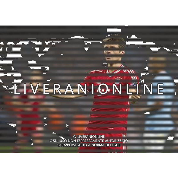 Bayern Munich\'s Thomas Muller celebrates scoring his sides second goal Photo by Stephen White/CameraSport Football - UEFA Champions League Group D - Manchester City v Bayern Munich - Wednesday 2nd October 2013 - Etihad Stadium - Manchester å© CameraSport - 43 Linden Ave. Countesthorpe. Leicester. England. LE8 5PG - Tel: +44 (0) 116 277 4147 - admin@camerasport.com - www.camerasport.com AG ALDO LIVERANI SAS ONLY ITALY