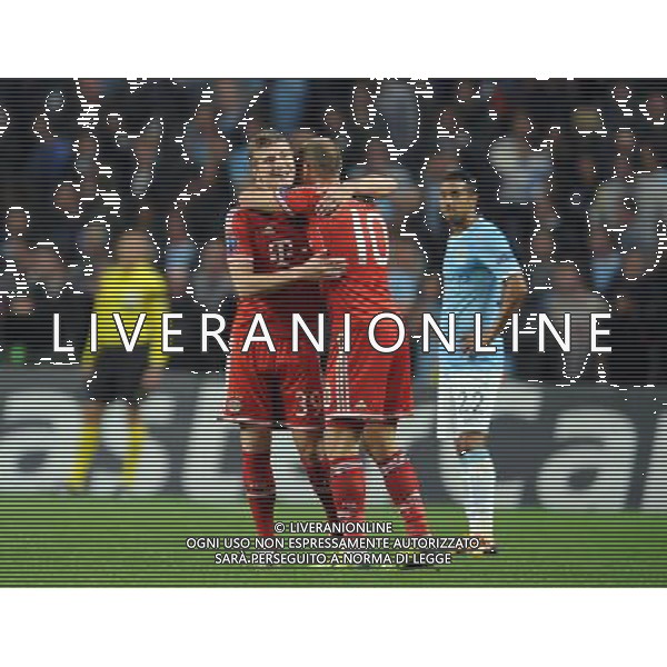 TONI KROOS \' ARJEN ROBBEN MANCHESTER CITY V BAYERN MUNICH FC MANCHESTER CITY V BAYERN MUNICH FC, CHAMPIONS LEAGUE GROUP D ETIHAD STADIUM, MANCHESTER, ENGLAND 02 October 2013 GAS74343 CHAMPIONS LEAGUE GROUP D 02/10/13 WARNING! This Photograph May Only Be Used For Newspaper And/Or Magazine Editorial Purposes. May Not Be Used For Publications Involving 1 player, 1 Club Or 1 Competition Without Written Authorisation From Football DataCo Ltd. For Any Queries, Please Contact Football DataCo Ltd on +44 (0) 207 864 9121 MANCHESTER CITY V BAYERN MONACO FC, CHAMPIONS LEAGUE GROUP D
