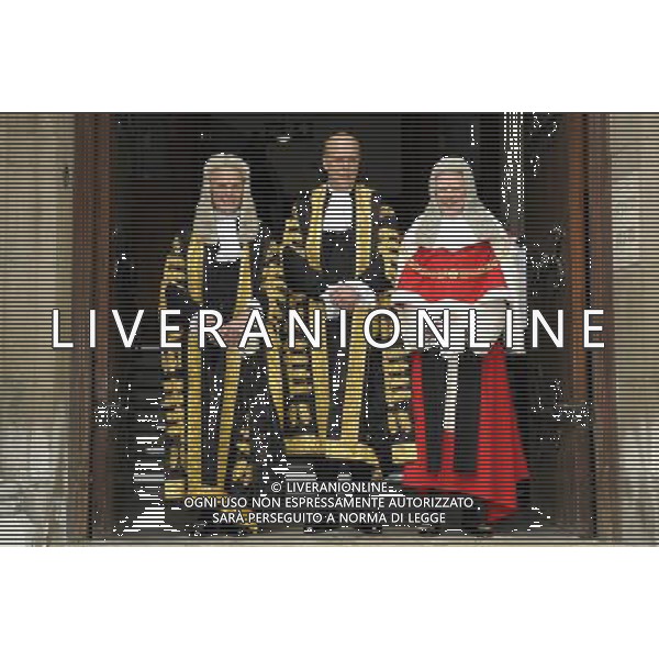 Sir Roger John Laugharne Thomas is sworn in as the new Lord Chief Justice of England and Wales at the Royal Courts of Justice, London, United Kingdom Pictured with him are Lord Chancellor Chris Grayling (c) and Lord Dyson, Master of the Rolls (l) ©photoshot/AGENZIA ALDO LIVERANI SAS - ITALY ONLY - EDITORIAL USE ONLY