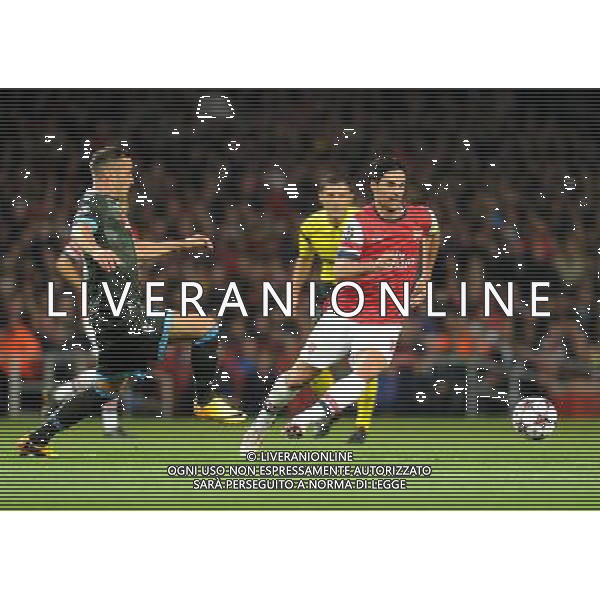  Mikel Arteta playing in the Champions League match between Arsenal and Napoli. Held at the Emirates Stadium, London, on Tuesday October 01, 2013. ©photoshot/AGENZIA ALDO LIVERANI SAS - ITALY ONLY - EDITORIAL USE ONLY