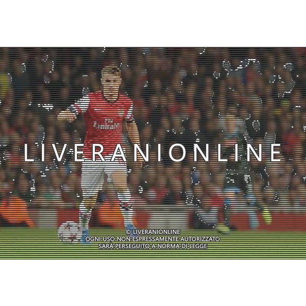  Aaron Ramsey playing in the Champions League match between Arsenal and Napoli. Held at the Emirates Stadium, London, on Tuesday October 01, 2013. ©photoshot/AGENZIA ALDO LIVERANI SAS - ITALY ONLY - EDITORIAL USE ONLY