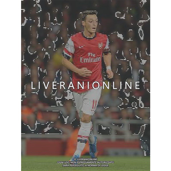  Mesut Ozil playing in the Champions League match between Arsenal and Napoli. Held at the Emirates Stadium, London, on Tuesday October 01, 2013. ©photoshot/AGENZIA ALDO LIVERANI SAS - ITALY ONLY - EDITORIAL USE ONLY