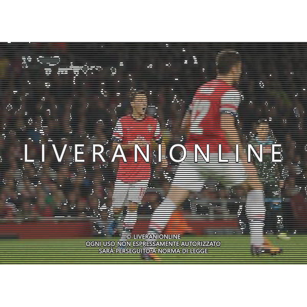  Mesut Ozil playing in the Champions League match between Arsenal and Napoli. Held at the Emirates Stadium, London, on Tuesday October 01, 2013. ©photoshot/AGENZIA ALDO LIVERANI SAS - ITALY ONLY - EDITORIAL USE ONLY