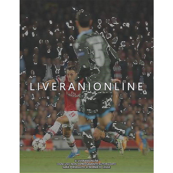  Mesut Ozil playing in the Champions League match between Arsenal and Napoli. Held at the Emirates Stadium, London, on Tuesday October 01, 2013. ©photoshot/AGENZIA ALDO LIVERANI SAS - ITALY ONLY - EDITORIAL USE ONLY