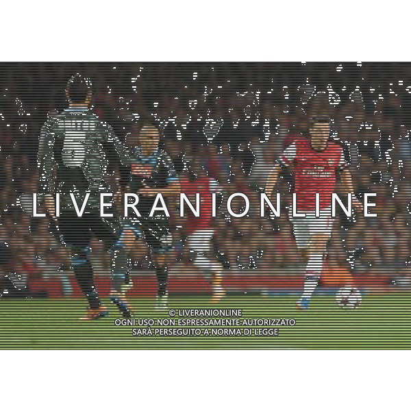  Mesut Ozil playing in the Champions League match between Arsenal and Napoli. Held at the Emirates Stadium, London, on Tuesday October 01, 2013. ©photoshot/AGENZIA ALDO LIVERANI SAS - ITALY ONLY - EDITORIAL USE ONLY