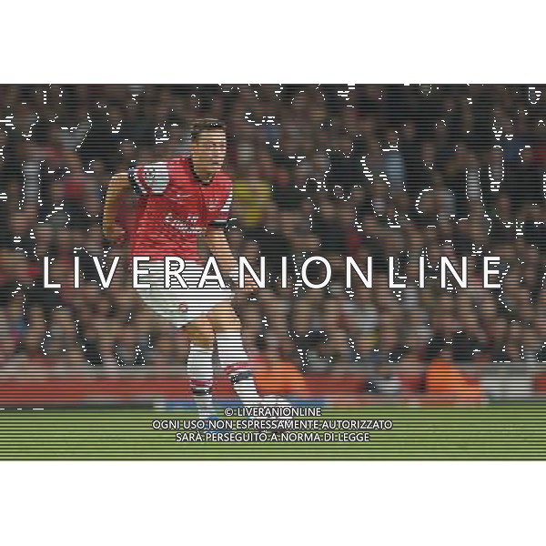  Mesut Ozil playing in the Champions League match between Arsenal and Napoli. Held at the Emirates Stadium, London, on Tuesday October 01, 2013. ©photoshot/AGENZIA ALDO LIVERANI SAS - ITALY ONLY - EDITORIAL USE ONLY