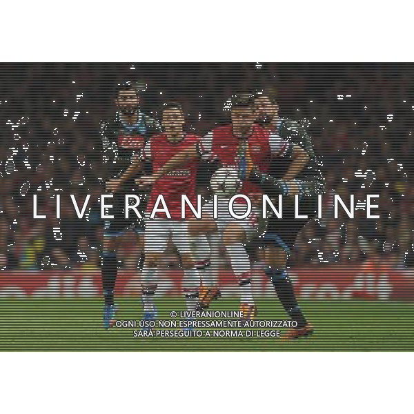  Mesut Ozil playing in the Champions League match between Arsenal and Napoli. Held at the Emirates Stadium, London, on Tuesday October 01, 2013. ©photoshot/AGENZIA ALDO LIVERANI SAS - ITALY ONLY - EDITORIAL USE ONLY