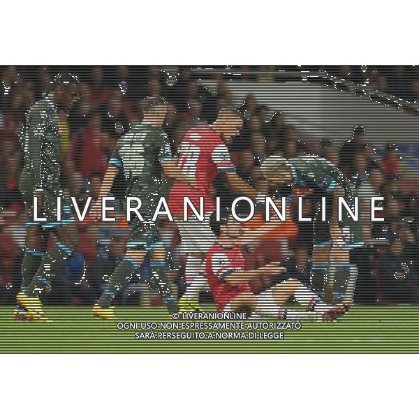  Mikel Arteta is fouled while playing in the Champions League match between Arsenal and Napoli. Held at the Emirates Stadium, London, on Tuesday October 01, 2013. ©photoshot/AGENZIA ALDO LIVERANI SAS - ITALY ONLY - EDITORIAL USE ONLY