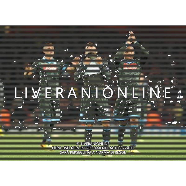  Disappointed Napoli players acknowledge their travelling fans in the Champions League match between Arsenal and Napoli. Held at the Emirates Stadium, London, on Tuesday October 01, 2013. ©photoshot/AGENZIA ALDO LIVERANI SAS - ITALY ONLY - EDITORIAL USE ONLY