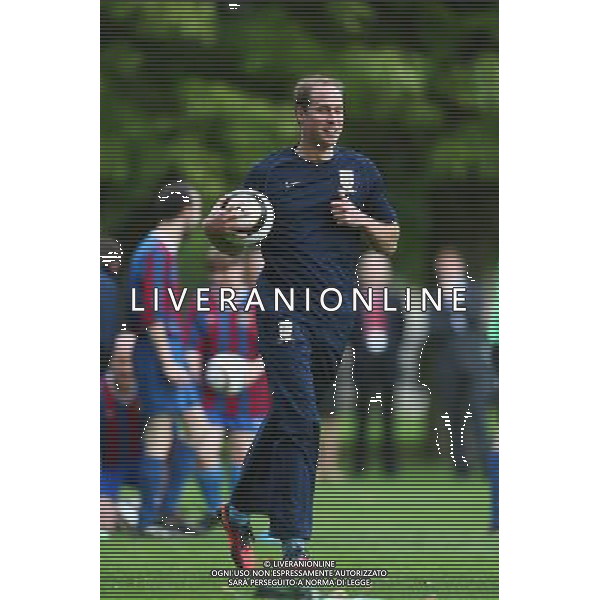 Prince William, Duke of Cambridge in his role as The President of The Football Association attends a coaching session during the first ever football match at Buckingham Palace between Civil Service FC and Polytechnic FC as part of The FA\'s 150th anniversary and an awards ceremony celebrating football\'s grassroots heroes at Buckingham Palace on October 7, 2013 in London, England. ©photoshot/AGENZIA ALDO LIVERANI SAS - ITALY ONLY - REALI INGLESI: Partita di calcio amichevole a Buchingham Palace. Il principe William presidente onorario della Football Association e ha festeggiato i 150 anni con tanti ospiti illustri ed ex calciatori.