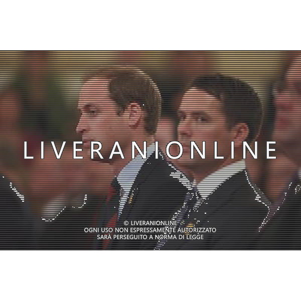 LONDON, ENGLAND - OCTOBER 07: Prince William, Duke of Cambridge, in his role as President of The Football Association, sits with former England footballer Michael Owen in the Ballroom of Buckingham Palace at an event to honour The FA\'s 150 Grassroots Heroes on October 7, 2013 in London, England. 150 volunteers who work to support grassroots football. were presented with a medal by The Duke of Cambridge and Greg Dyke, the Charmian of the Football Association. To celebrate 150 years of the FA, an official Southern Amateur League fixture football match will take place in the grounds of Buckingham Palace between two of the oldest amateur clubs in England. The match will be played between Civil Service FC, the sole surviving club from the eleven that met to create The FA in 1863, and Polytechnic FC, which was formed in 1875. ©PHOTOSHOT/AGENZIA ALDO LIVERANI SAS - ITALY ONLY - EDITORIAL USE ONLY