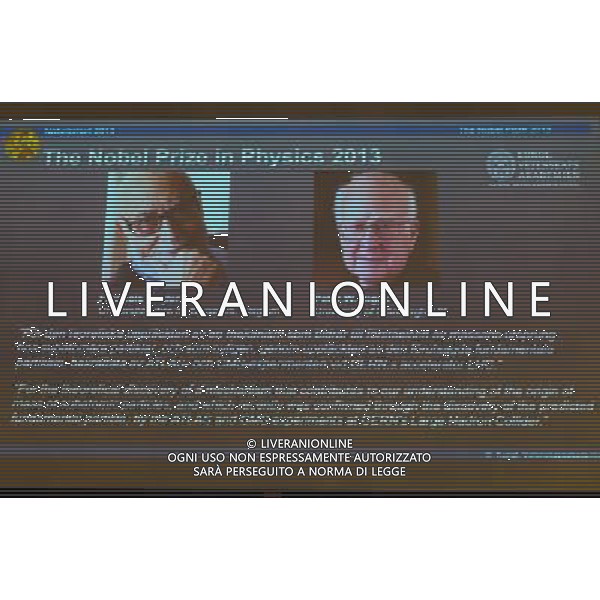 (131008) -- STOCKHOLM, Oct. 8, 2013 () -- Pictures of Belgium\'s scientist Francois Englert (L) and British scientist Peter Higgs are projected on a screen as Staffan Normark (not in photo), permanent Secretary of the Royal Swedish Academy of Sciences, announces the laureates of the 2013 Nobel Prize in Physics during a press conference in Stockholm, Sweden, on Oct. 8, 2013. The 2013 Nobel Prize in Physics went to Francois Englert from Belgium and British scientist Peter Higgs, announced the Royal Swedish Academy of Sciences in Stockholm on Tuesday. (/Shi Tiansheng) ©photoshto/AGENZIA ALDO LIVERANI SAS - ITALY ONLY - Conferenza stampa di presentazione dei vincitori del premio 2013 Nobel per la Fisica a Stoccolma, in Svezia, l\'8 ottobre 2013. Il Premio Nobel per la Fisica 2013 a Franois Englert dal Belgio e scienziato britannico Peter Higgs