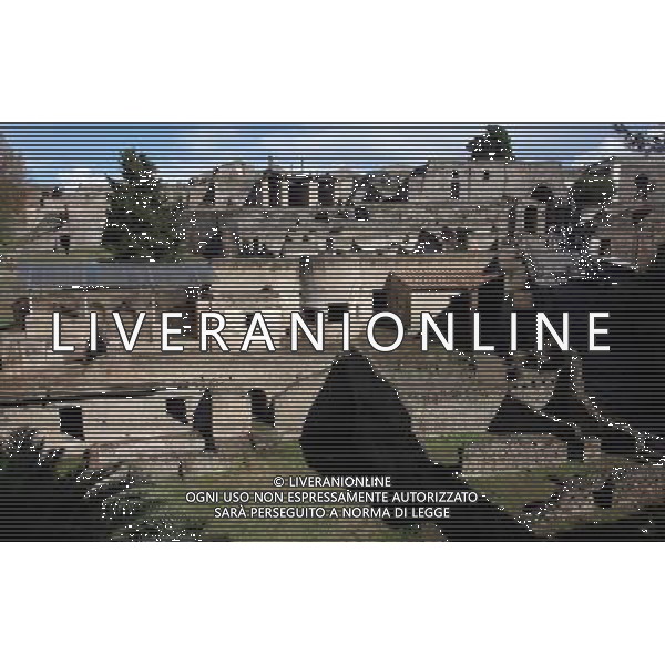 (131012) -- BEIJING, Oct. 12, 2013 () -- Photo taken on Oct. 9, 2013 shows a view of suburban baths in Pompei, Italy. When Vesuvius erupted on Aug. 24, AD 79, it engulfed the flourishing Roman towns of Pompei. These have been progressively excavated and made accessible to the public since the mid-18th century, reappearing the vast expanse of the commercial town of Pompei. The UNESCO Commitee inscribed Archaeological Areas of Pompei, Herculaneum and Torre Annunziata as a world heritage site in 1997. (/Du Juanjuan) ©Photoshot/Ag. Aldo Liverani s.a.s.-Only Italy-Editorial Use Only