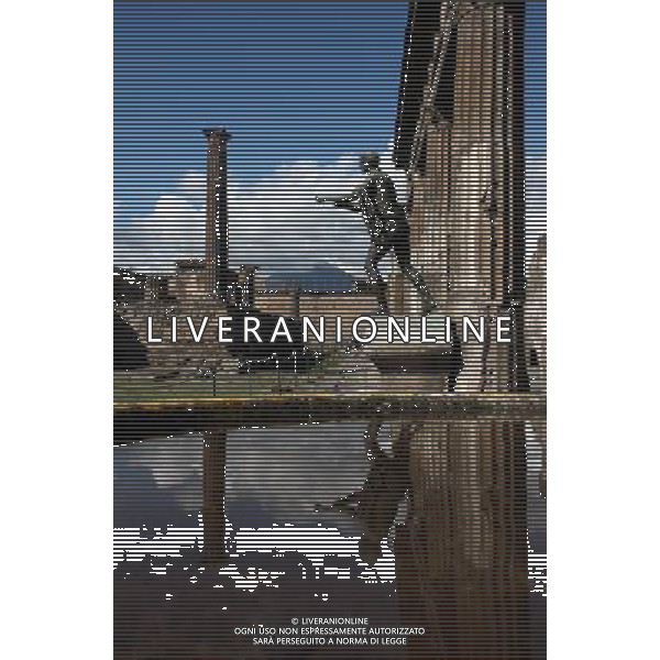 (131012) -- BEIJING, Oct. 12, 2013 () -- Photo taken on Oct. 9, 2013 shows a view of temple of Apollo in Pompei, Italy. When Vesuvius erupted on Aug. 24, AD 79, it engulfed the flourishing Roman towns of Pompei. These have been progressively excavated and made accessible to the public since the mid-18th century, reappearing the vast expanse of the commercial town of Pompei. The UNESCO Commitee inscribed Archaeological Areas of Pompei, Herculaneum and Torre Annunziata as a world heritage site in 1997. (/Du Juanjuan) ©Photoshot/Ag. Aldo Liverani s.a.s.-Only Italy-Editorial Use Only