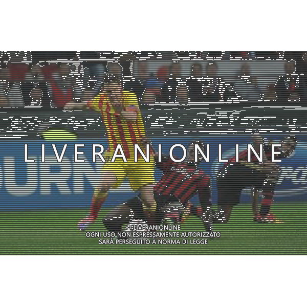 UEFA Champions League - Fase a gironi 3Â° giornata gruppo H Milano 22-10-2013 Stadio Giuseppe Meazza San Siro Milan - Barcellona nella foto Messi e Muntari foto Roberto Garavaglia - ag. Aldo Liverani