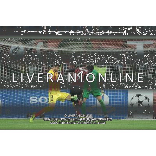 UEFA Champions League - Fase a gironi 3Â° giornata gruppo H Milano 22-10-2013 Stadio Giuseppe Meazza San Siro Milan - Barcellona nella foto sull\'1 a 1 occasione Muntari stoppata da Pique\' foto Roberto Garavaglia - ag. Aldo Liverani
