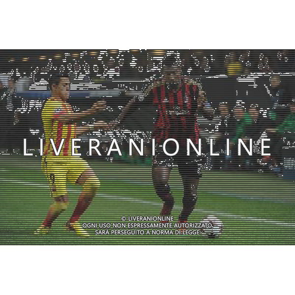 UEFA Champions League - Fase a gironi 3¡ giornata gruppo H Milano 22-10-2013 Stadio Giuseppe Meazza San Siro Milan - Barcellona nella foto Kevin Constant (Milan) e sulla SX Alexis Sanchez (Barcellona) foto Roberto Garavaglia - ag. Aldo Liverani
