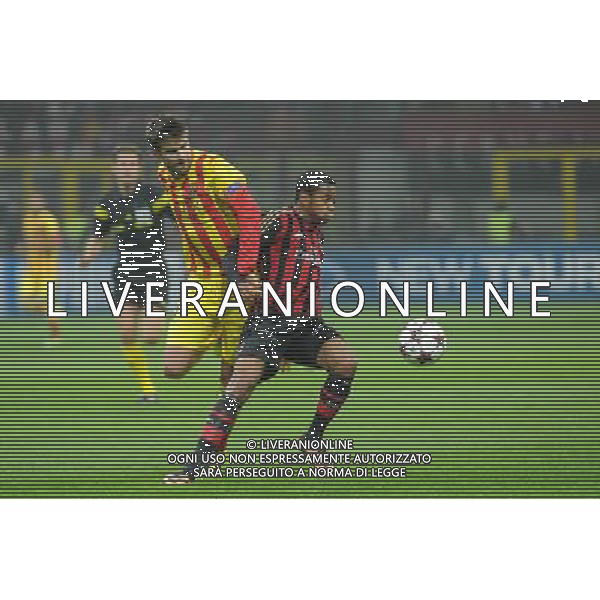 UEFA Champions League - Fase a gironi 3¡ giornata gruppo H Milano 22-10-2013 Stadio Giuseppe Meazza San Siro Milan - Barcellona nella foto Robinho (Milan) e sulla SX Gerard Pique\' (Barcellona) foto Roberto Garavaglia - ag. Aldo Liverani